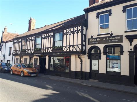 THE TUDOR HOTEL .